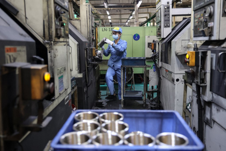 China’s Factories Show Resilience Amid Trade Strains and Domestic Pressures
