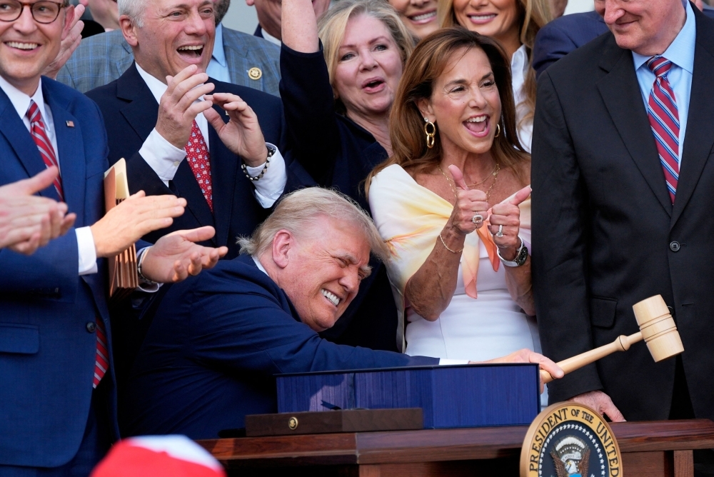 Trump Signs Controversial Tax and Spending Bill Amidst Fourth of July Spectacle