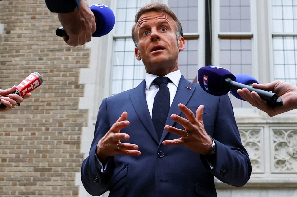 Macron’s Candid Warning: ‘Putin is a Predator, an Ogre at Our Gates’